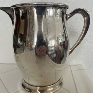 Pitcher: silver in classic design. 7.5" x 8.5" silver on copper.